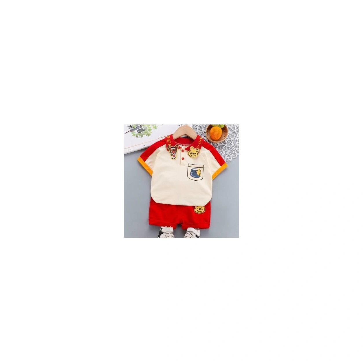 Cream Character-Patch Polo and Red Shorts Set showcase