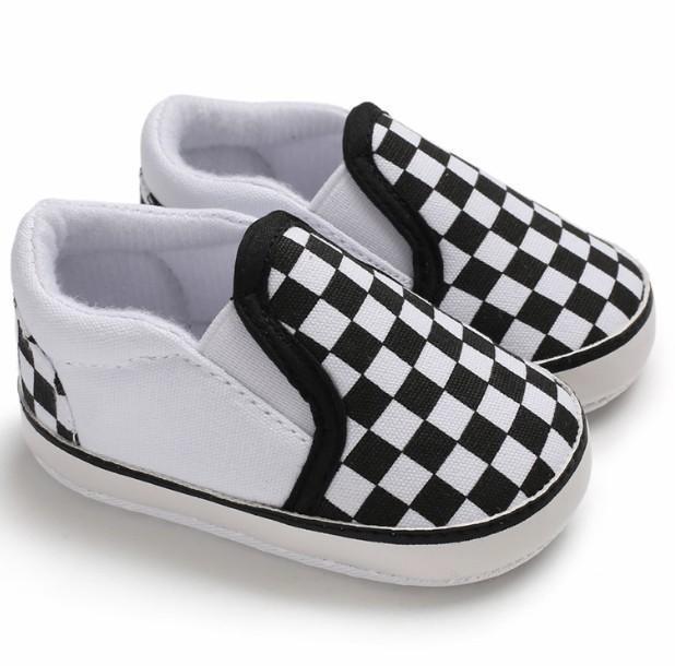Black White Checker Slip-On Shoes showcase